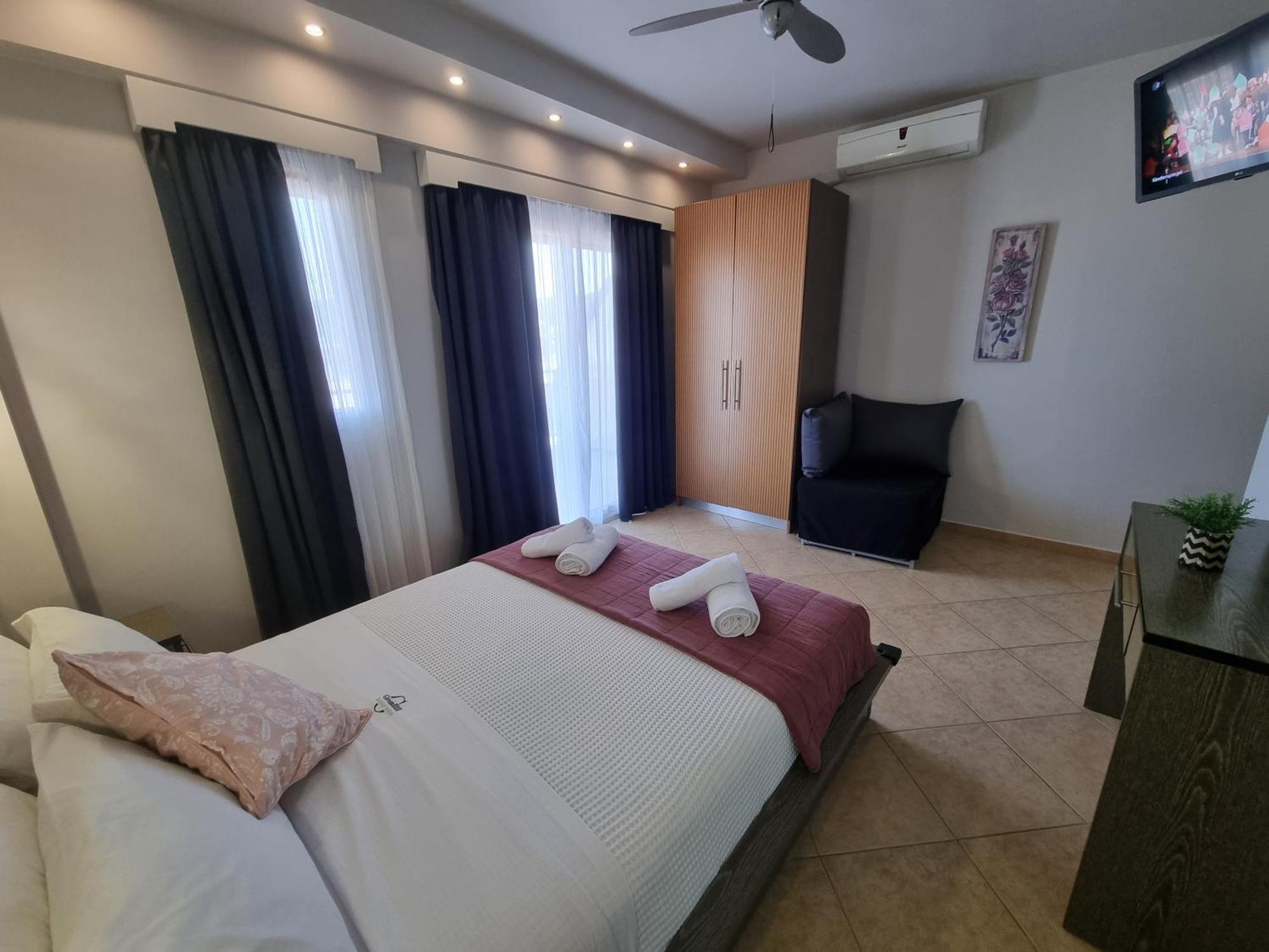 Greenhill Holiday Suites Sarti Esterno foto