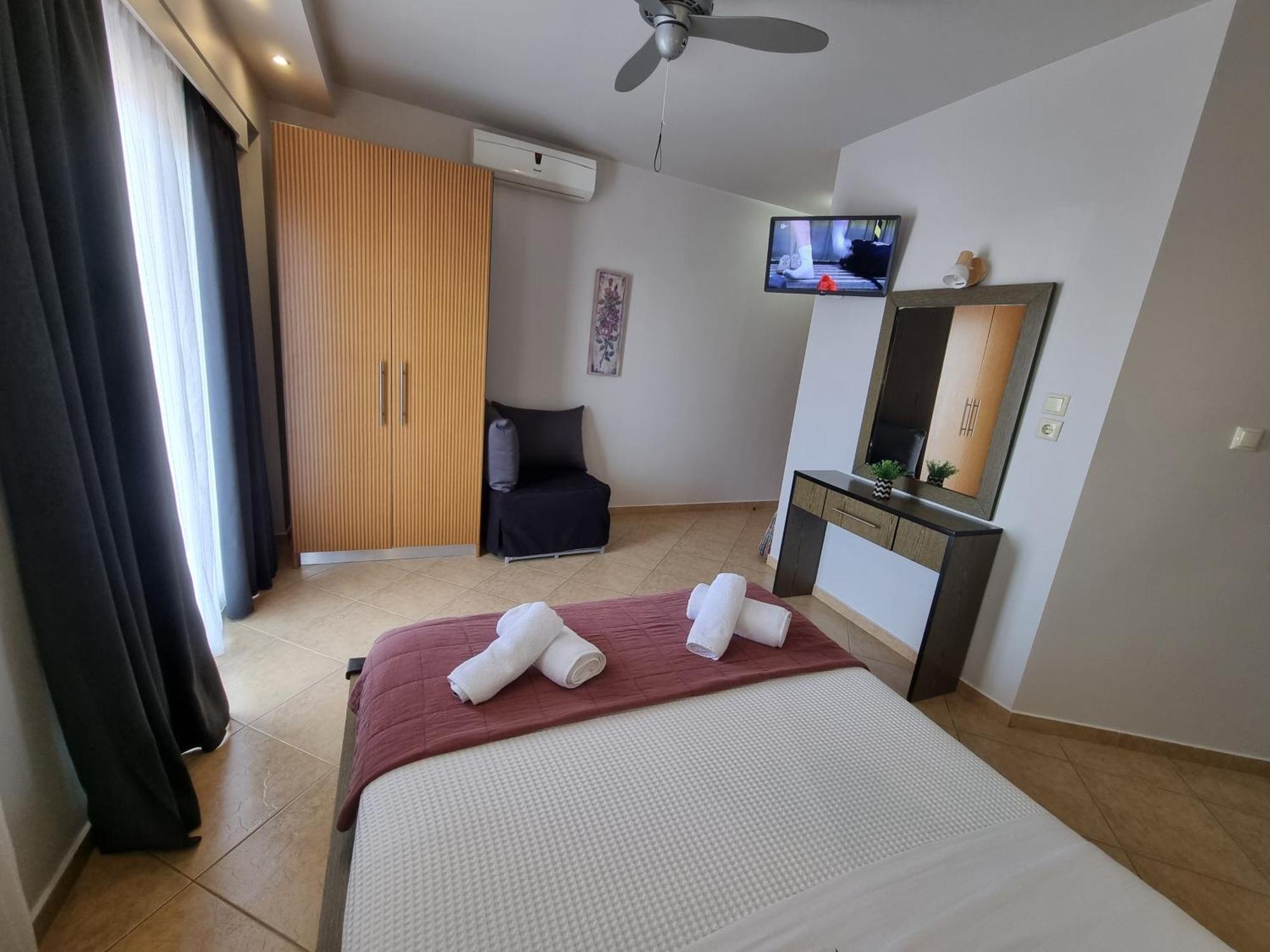 Greenhill Holiday Suites Sarti Esterno foto