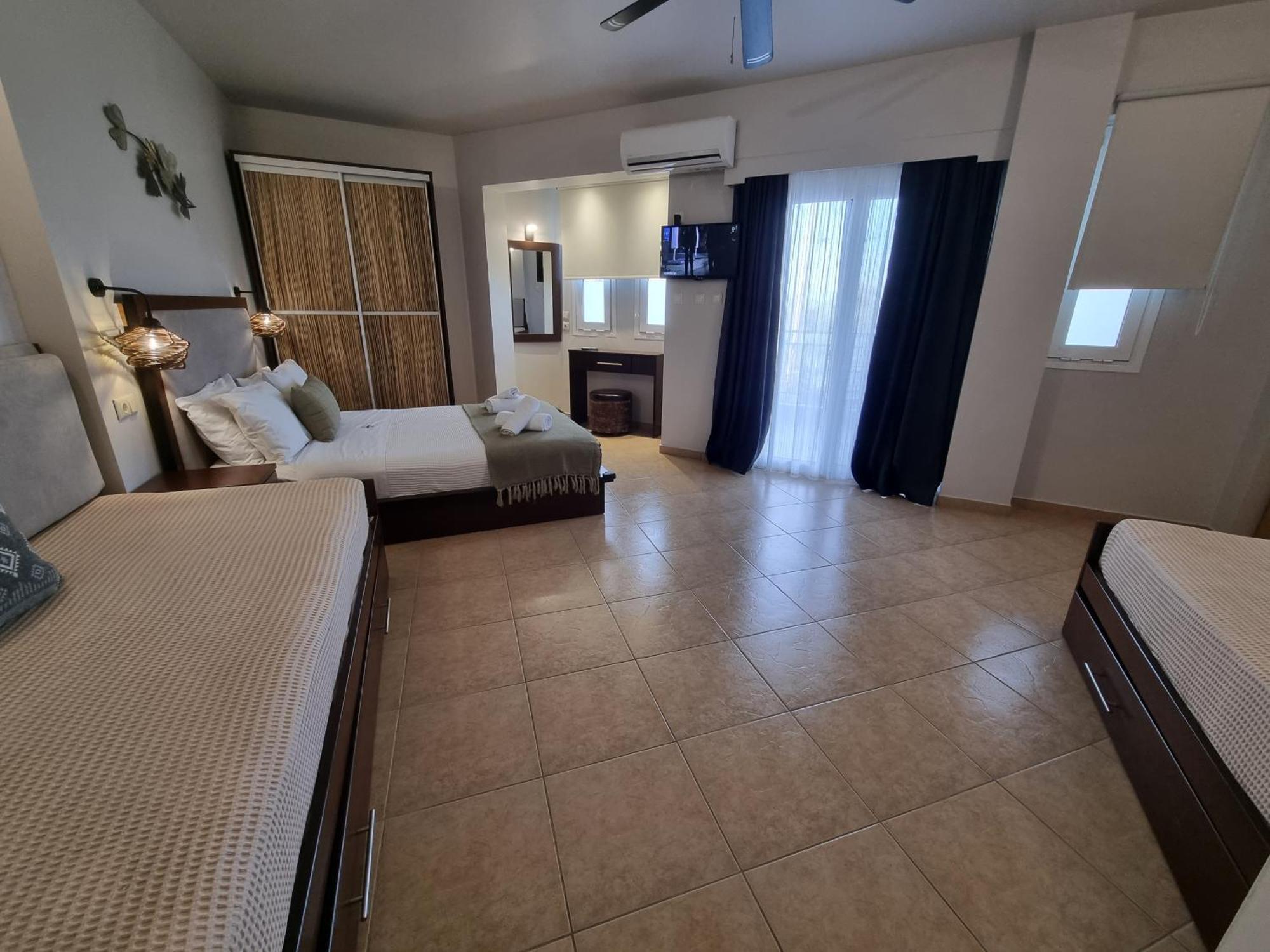 Greenhill Holiday Suites Sarti Esterno foto