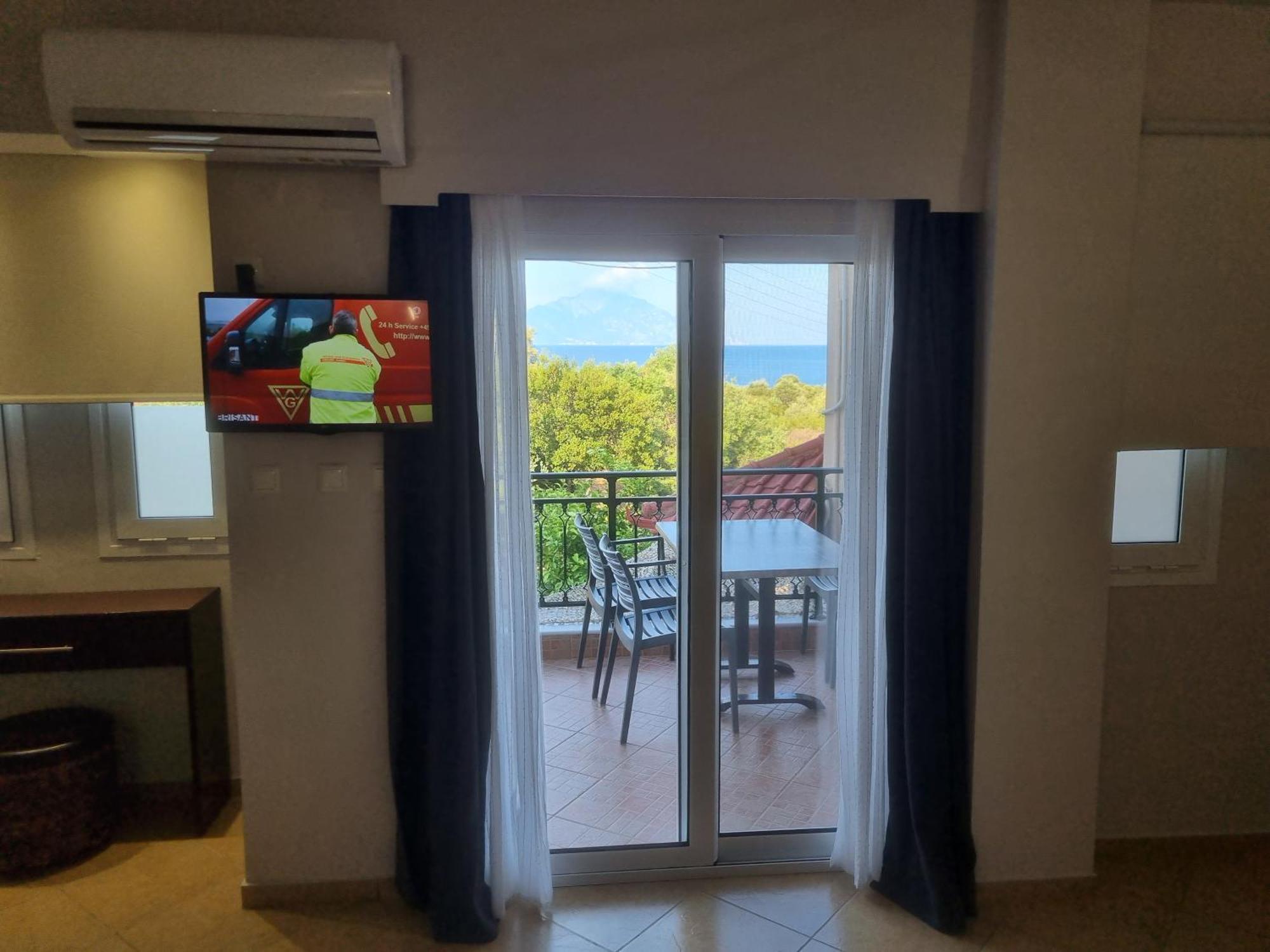 Greenhill Holiday Suites Sarti Esterno foto