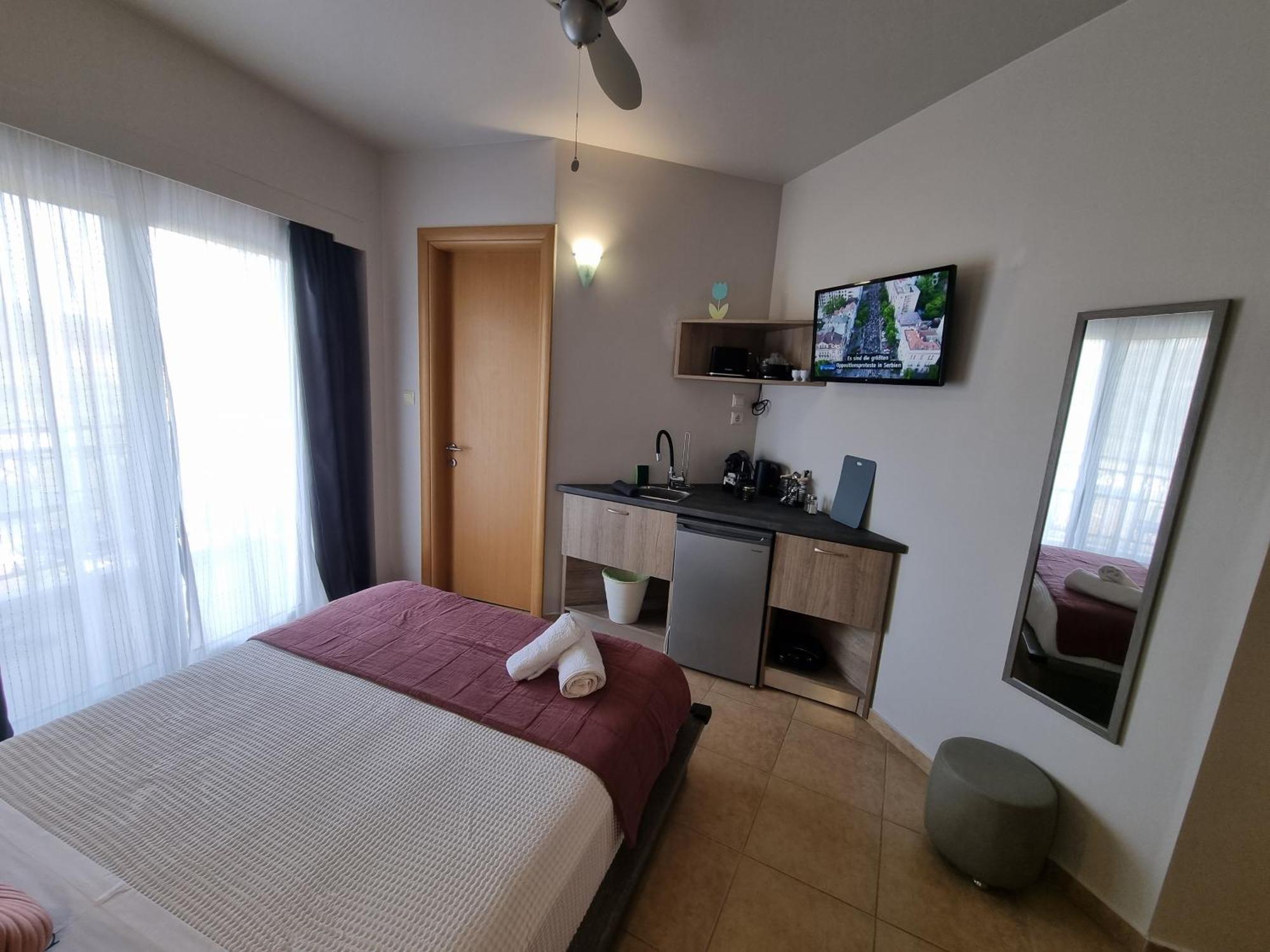Greenhill Holiday Suites Sarti Esterno foto